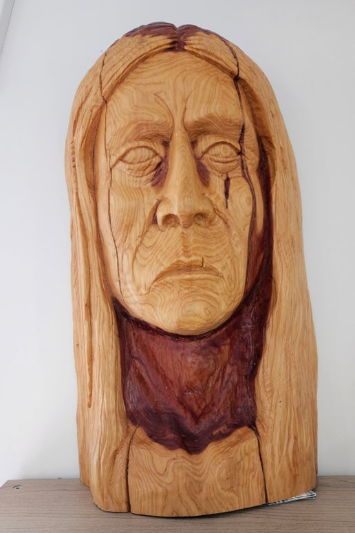 Native Man Carving Cherry Wood